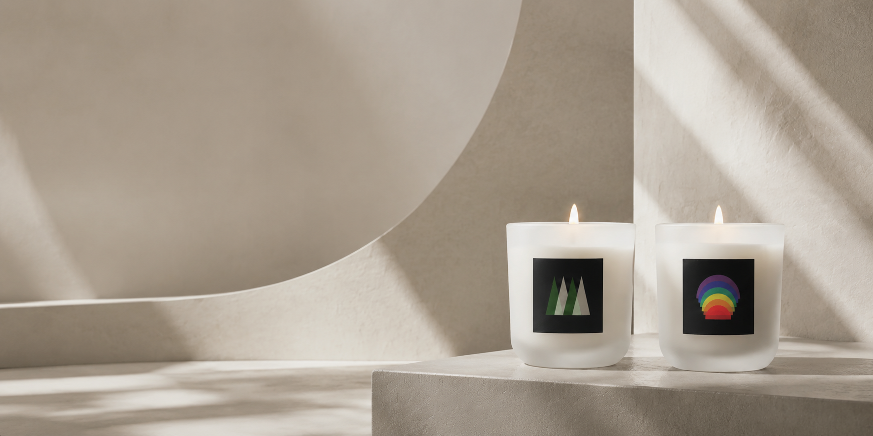 Northern Reverie and Celestial Origin frosted-glass candles from the Sawdust & Embers Ethereal Journeys Collection.